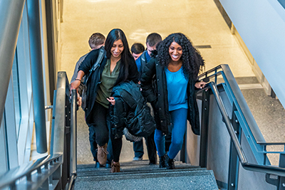 Kirkwood adult students walking up stairs to class